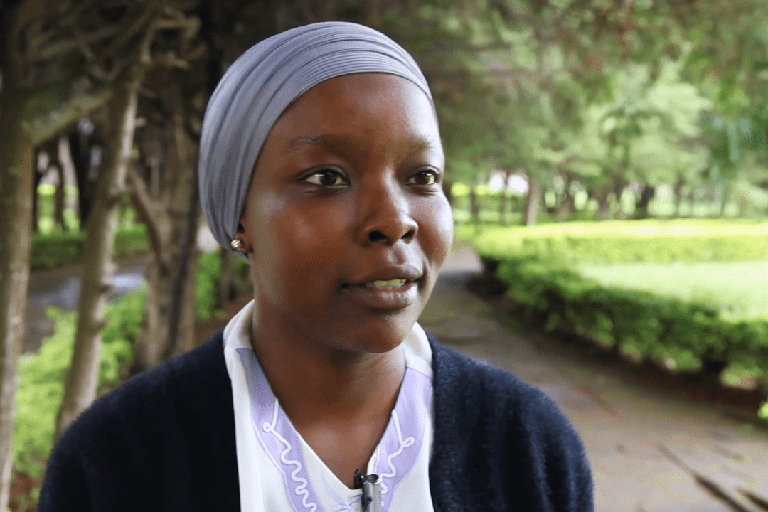 Tanzanian student talks to camera
